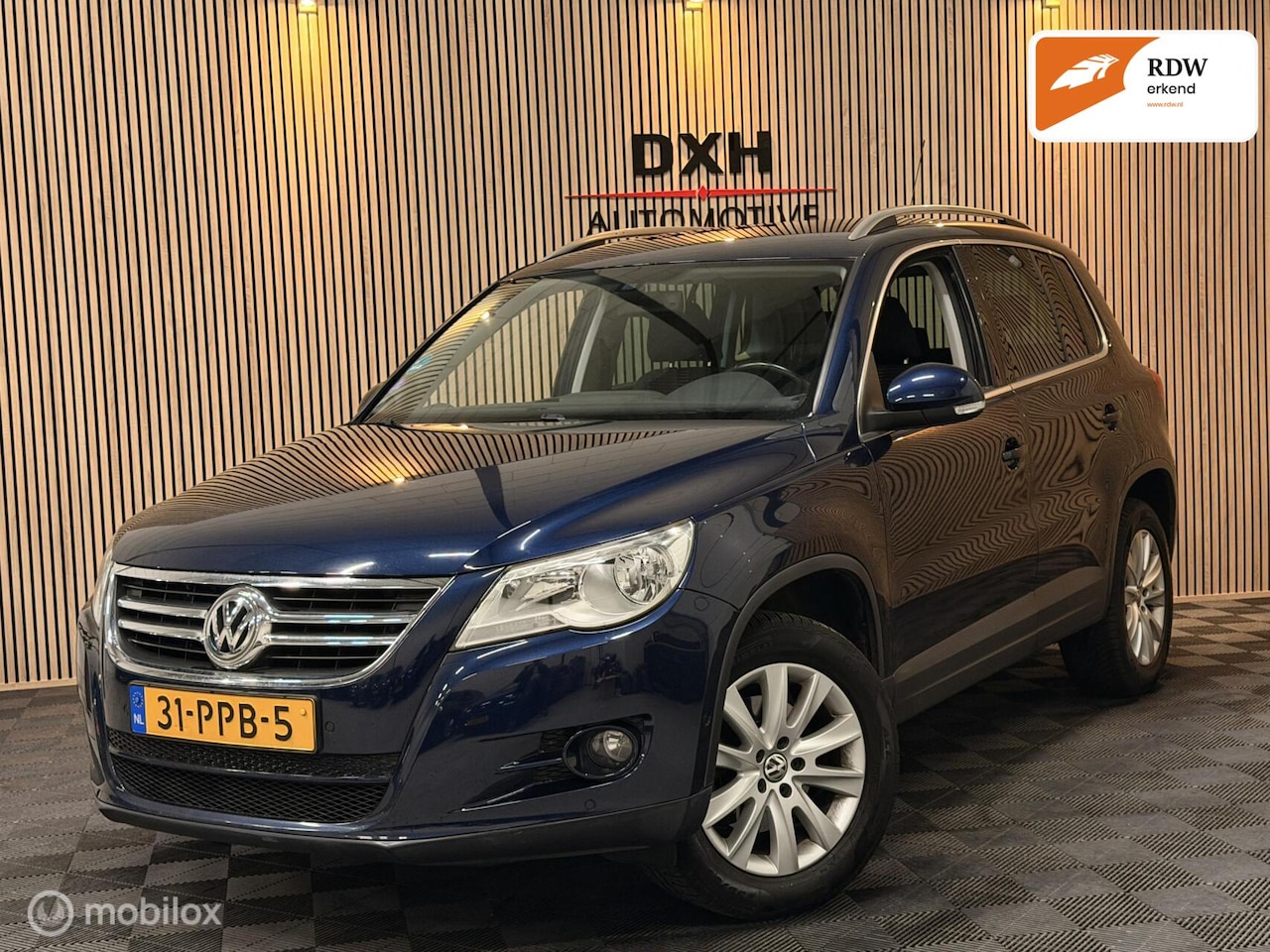 Volkswagen Tiguan - 1.4 TSI Sport&Style APK-3/2027 CARPLAY PDC - AutoWereld.nl
