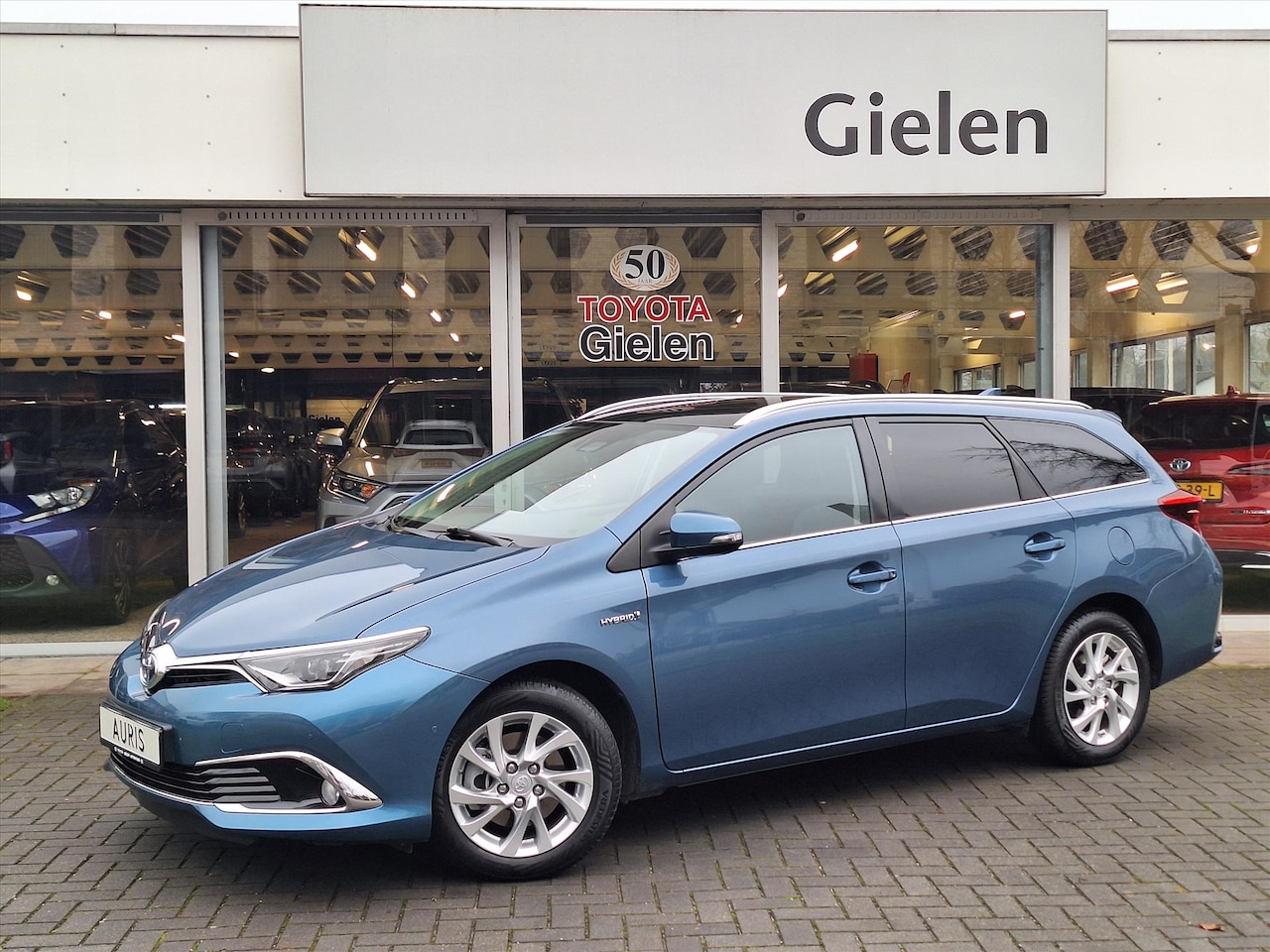 Toyota Auris Touring Sports - Touring Sports 1.8 Hybrid Executive | Panoramadak, Keyless, Half leer, Stoelverwarming, Pa - AutoWereld.nl