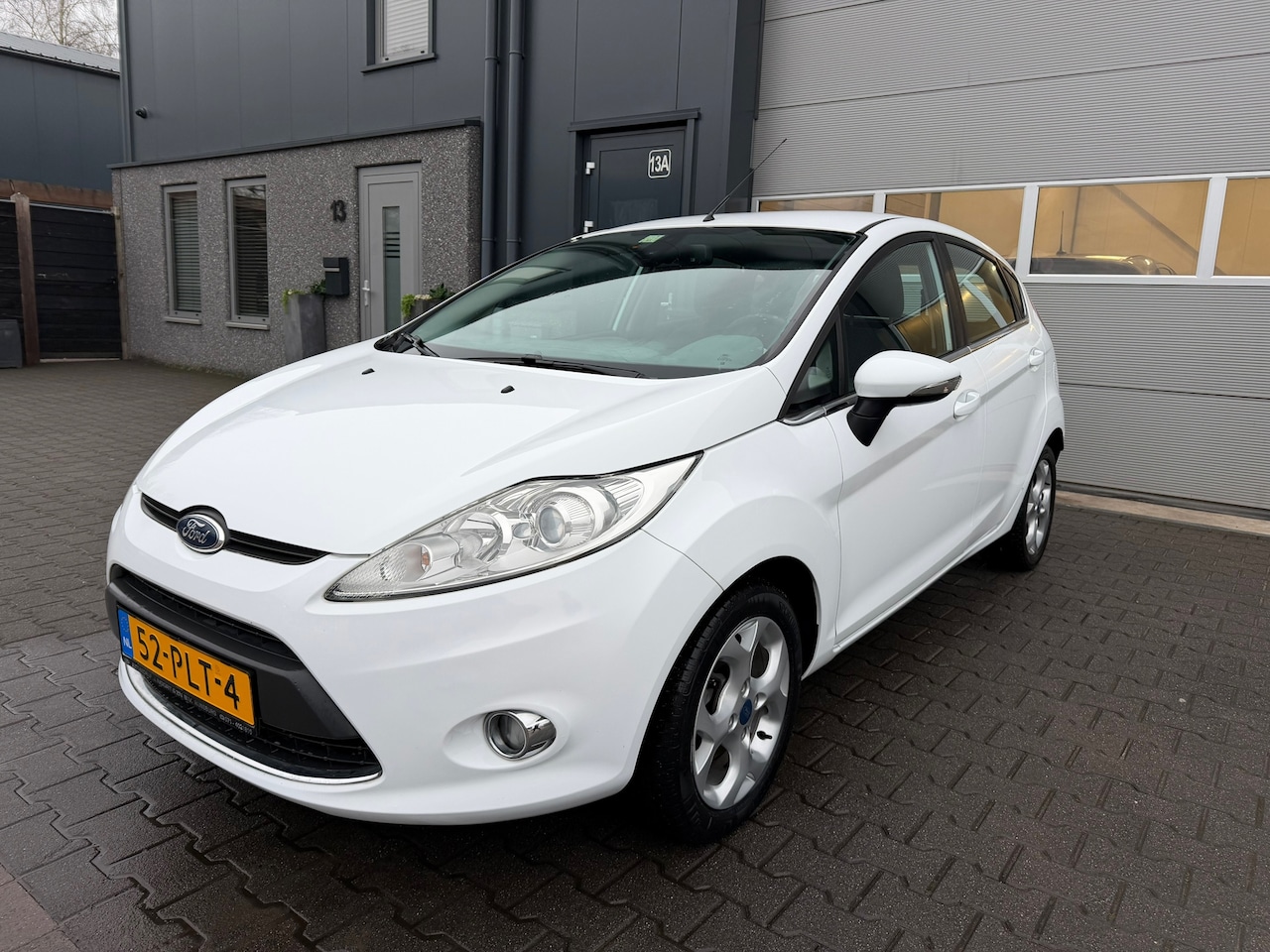 Ford Fiesta - 1.25 Titanium 5Drs|Airco|Cruiscontrole| Parkeersensor|Nieuwe APK|DBriem vervangen - AutoWereld.nl