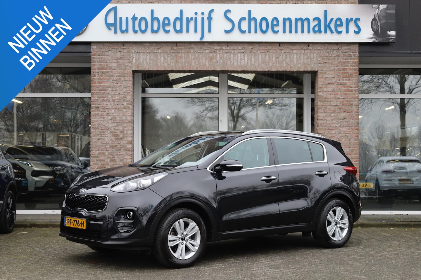 Kia Sportage - 1.6 GDI First Edition CAMERA NAVI DAB TREKHAAK CRUISE CLIMA 17"LMV ALL-SEASONS NAP - AutoWereld.nl