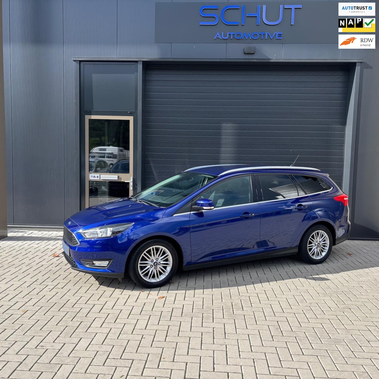 Ford Focus Wagon - 125pk Titanium CARPLAY | CLIMA | STOELVERWARMING | NAVI | CAMERA | TREKHAAK AFNEEMBAAR - AutoWereld.nl