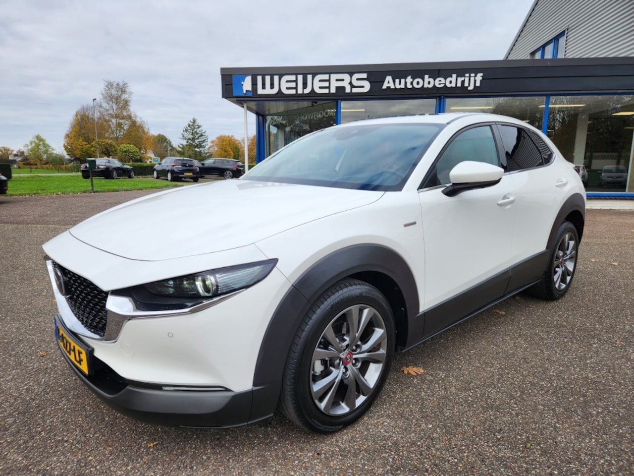 Mazda CX-30 - 2.0 SA-X 100th Anniversary Ed. Automaat 180PK, Leder, schuifdak, trekhaak, 360 camera, BOS - AutoWereld.nl