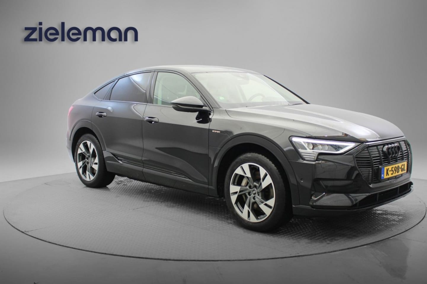 Audi e-tron Sportback - 55 quattro Business edition 95 kWh Blackline - Navi, Cruise, Clima, Memory, SOH 88% - AutoWereld.nl