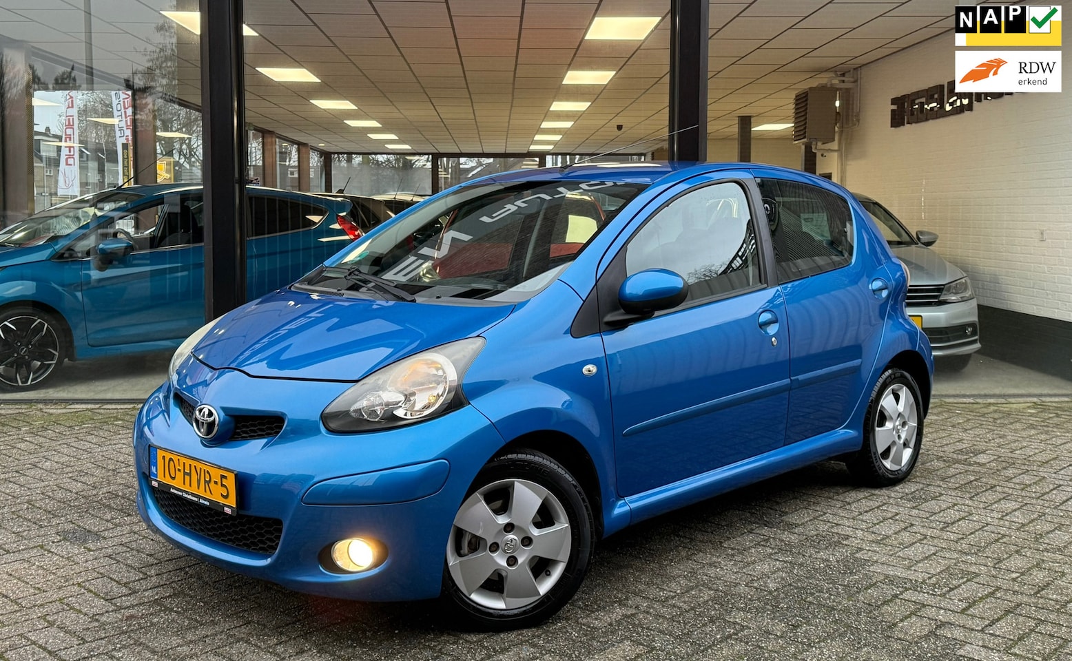 Toyota Aygo - 1.0-12V 5drs Dyn Blue AUTOMAAT | AIRCO | LMV | NAP - AutoWereld.nl