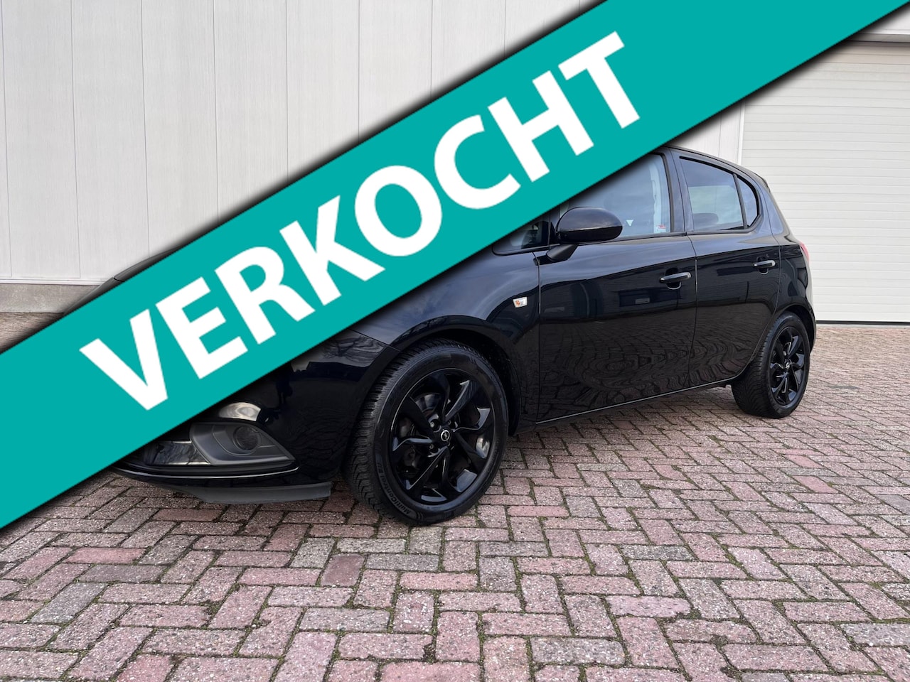 Opel Corsa - 1.4 black edition 5 deurs stoel/stoer verwarming carplay trekhaak - AutoWereld.nl