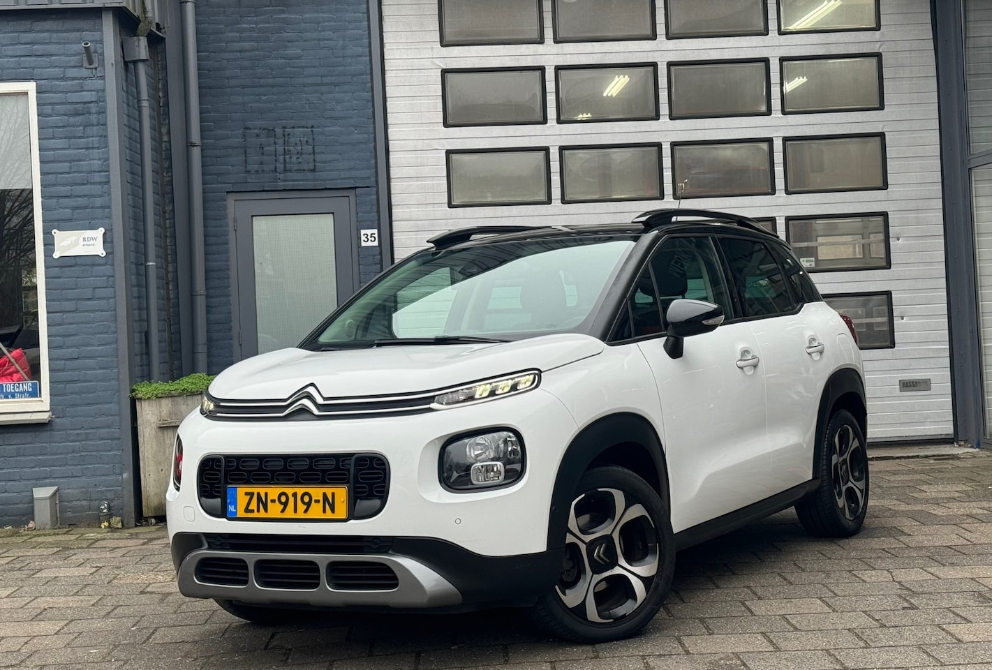 Citroën C3 Aircross - 1.2 PureTech S&S Shine | Airco | Camera | N.A.P | Navi - AutoWereld.nl