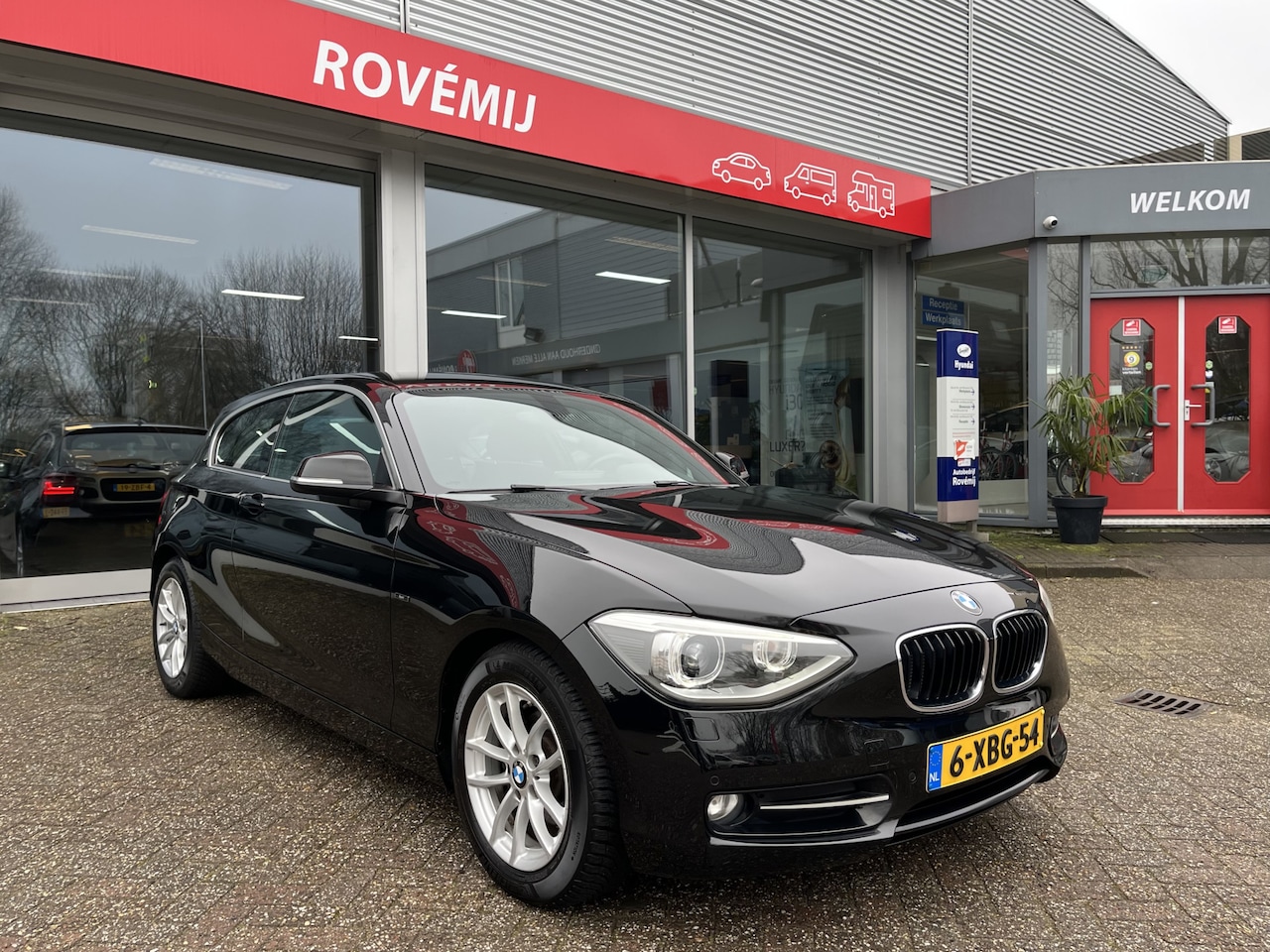 BMW 1-serie - 114i EDE Corporate Lease Edition Cruise, Navi, Parkeersensoren. - AutoWereld.nl
