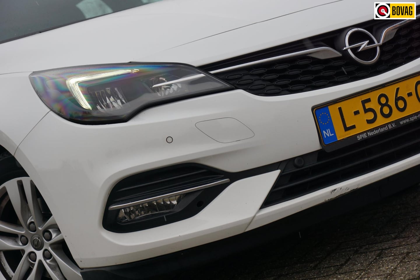 Opel Astra Sports Tourer - 1.2 Edition - Summit White - ASTRA AKTIE X4 V.A. €8.995,- - AutoWereld.nl