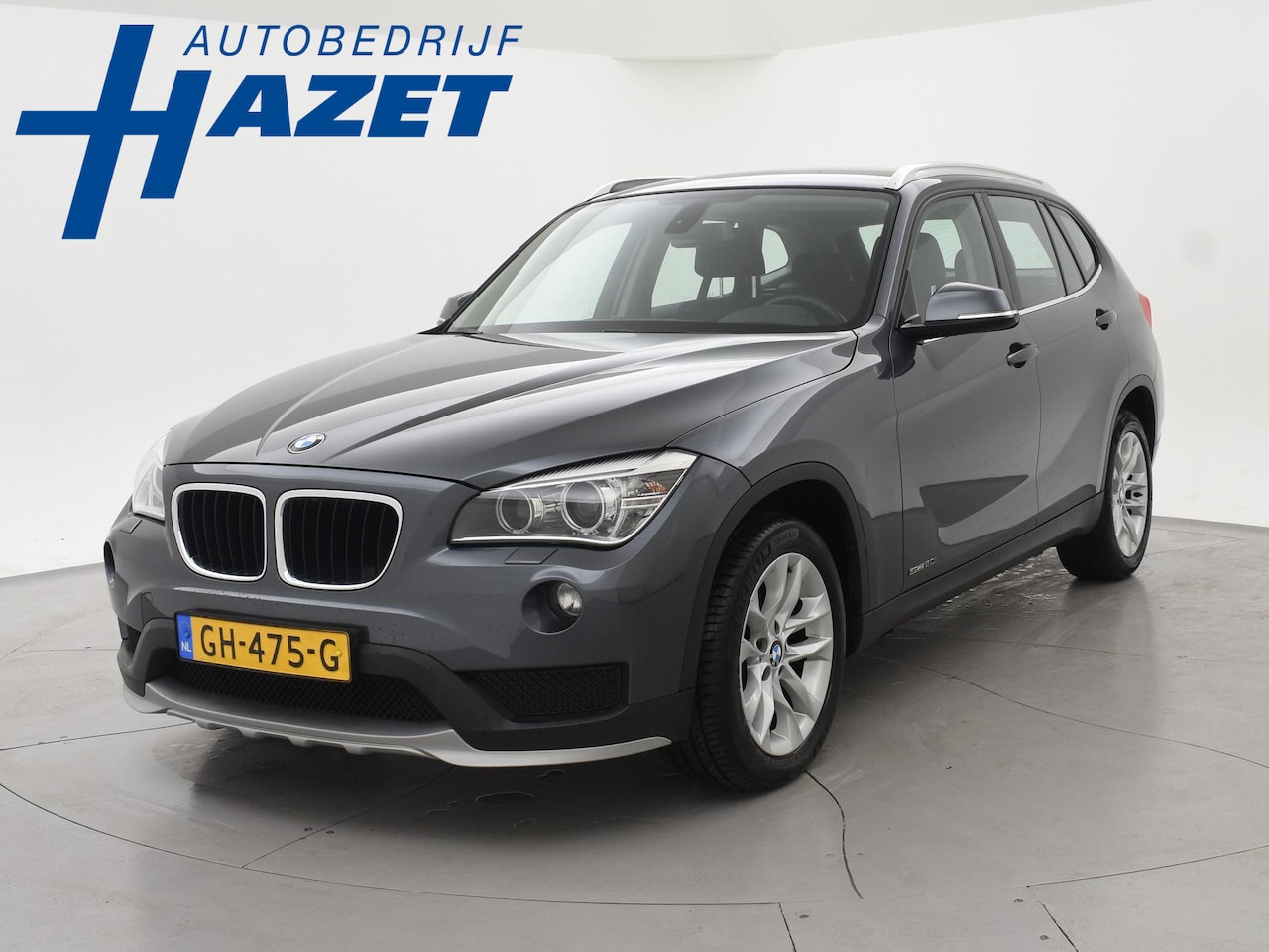 BMW X1 - sDrive20i 184 PK AUT. ORIG. NL *94.700 KM* + TREKHAAK | NAVI PRO | MINERALGRAU - AutoWereld.nl