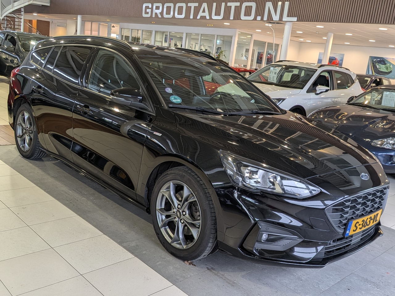 Ford Focus Wagon - 1.0 EcoBoost Titanium Business Airco, Cruise Control, Trekhaak, Stuurbekrachtiging - AutoWereld.nl