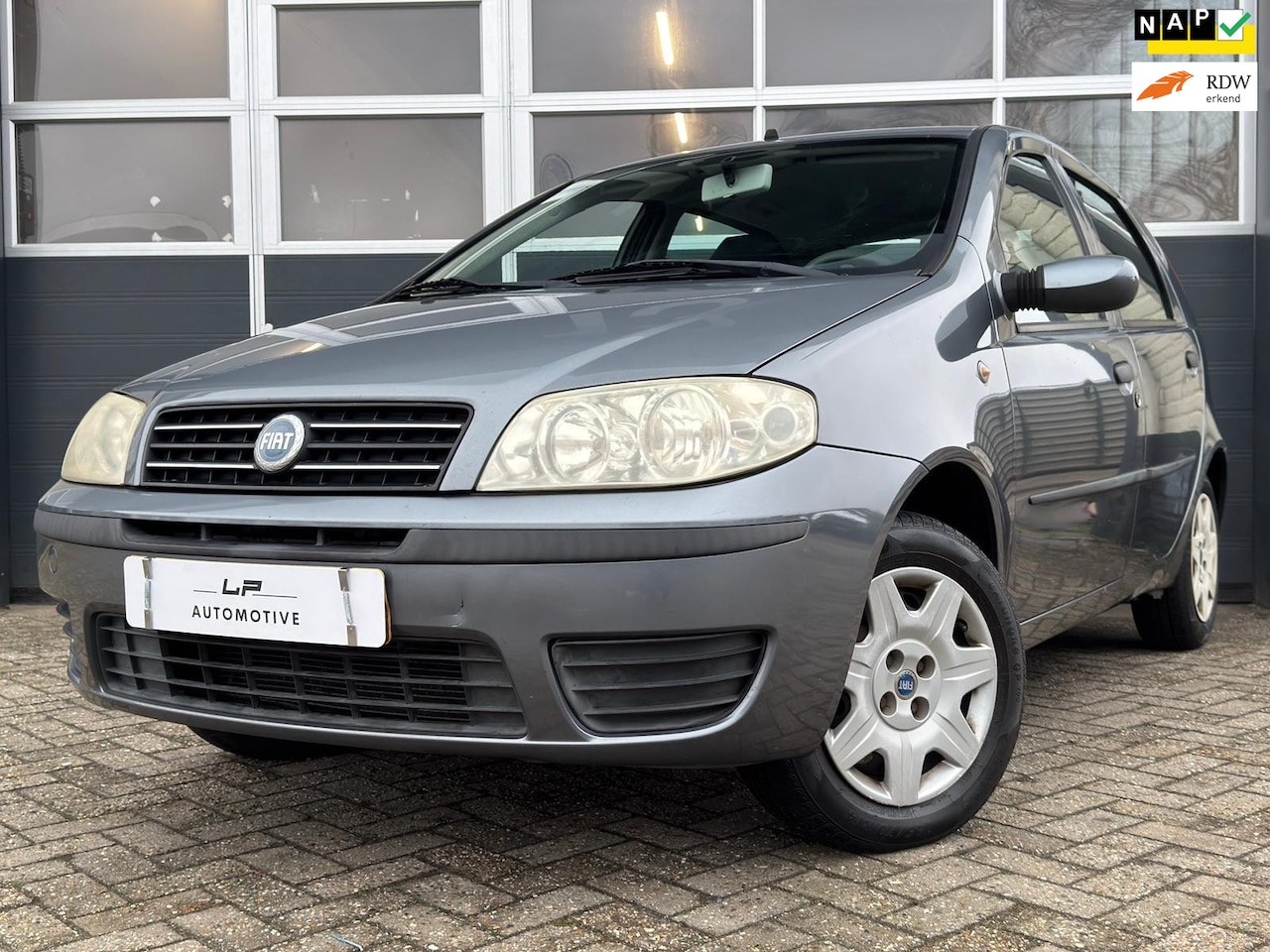 Fiat Punto - 1.2 Dynamic / Lage km / NL-auto / Airco / Elek. ramen - AutoWereld.nl