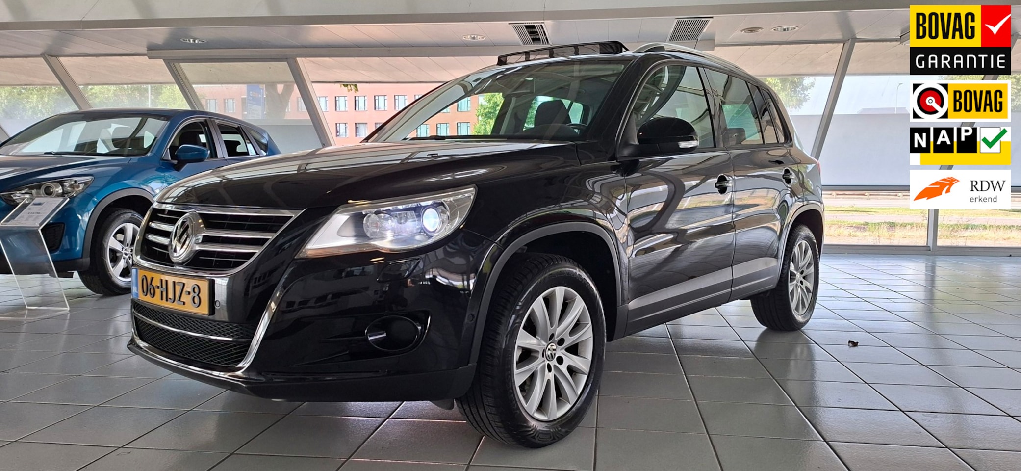 Volkswagen Tiguan - 1.4 TSI Sport&Style, pano/ecc/Applecarplay/cruise - AutoWereld.nl