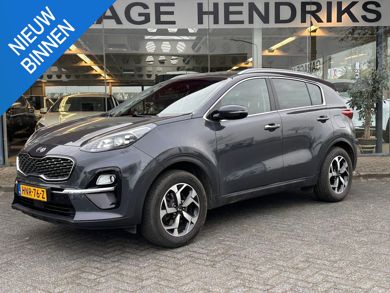 Kia Sportage - 1.6 GDI DynamicLine | Leder | Trekhaak | Stoel&Stuurverwarming | JBL-Audio | Climate | Nav - AutoWereld.nl