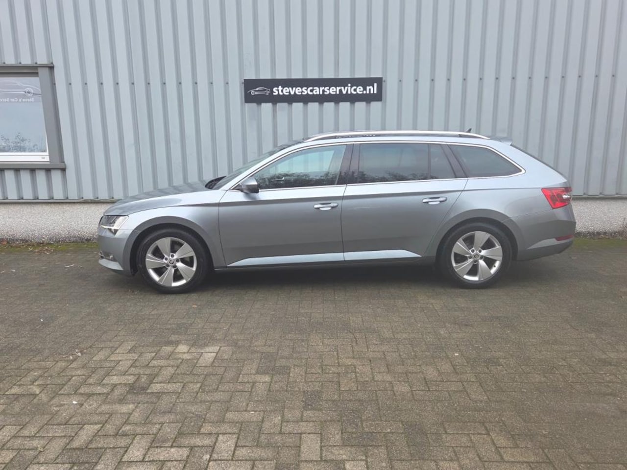 Skoda Superb Combi - 1.4 TSI Ambition Business bomvolle auto leer panoramadak etc - AutoWereld.nl