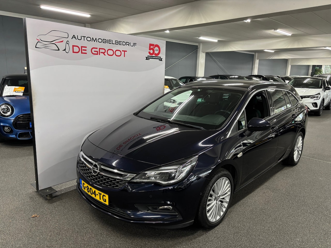 Opel Astra Sports Tourer - 1.4 Business Executive met Trekhaak, Parkeersensoren voor& achter, Camera, Climat/Cruise C - AutoWereld.nl