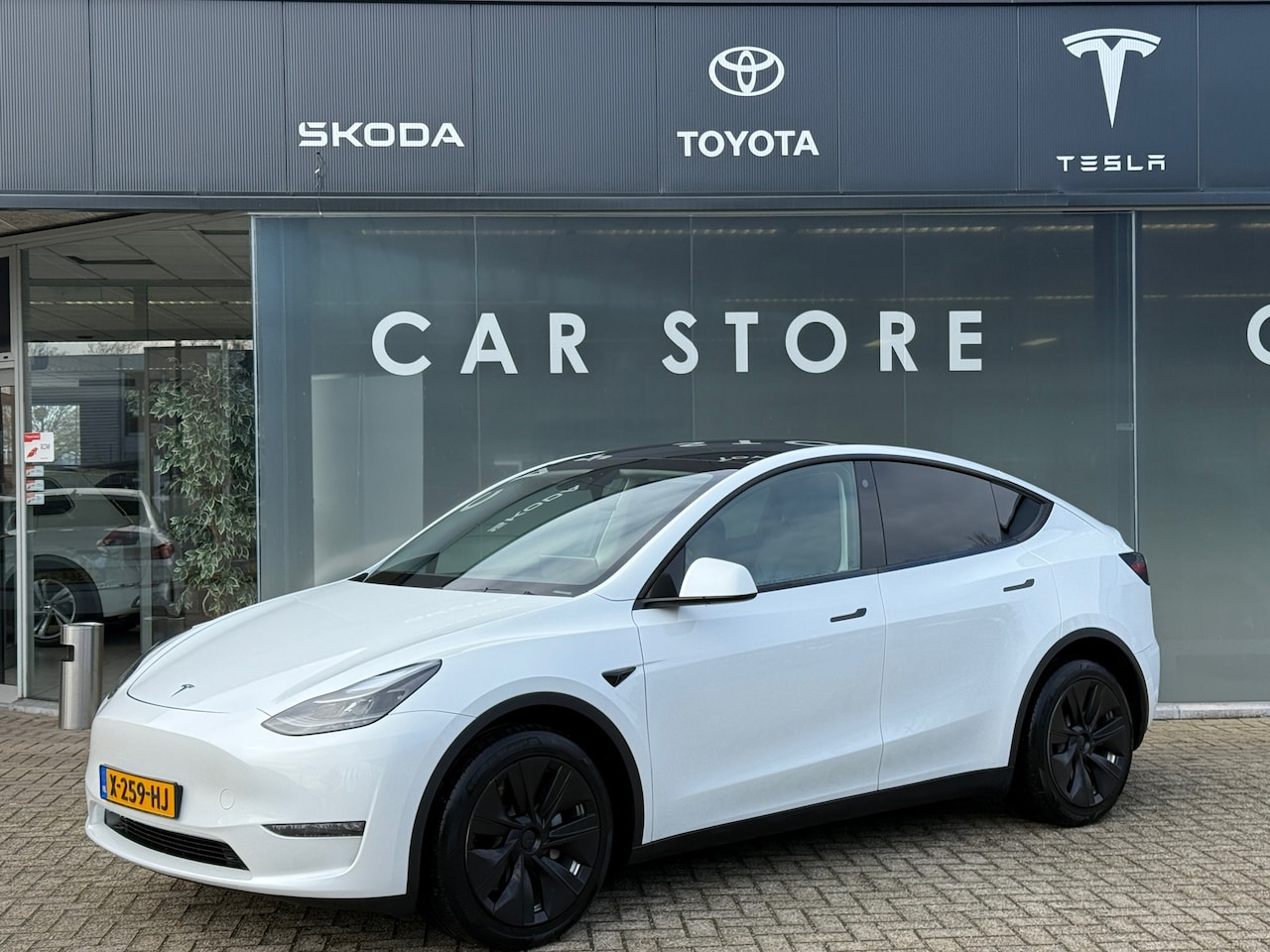 Tesla Model Y - Long Range AWD 75 kWh 94% SOH FSD Dealer Onderhouden - AutoWereld.nl