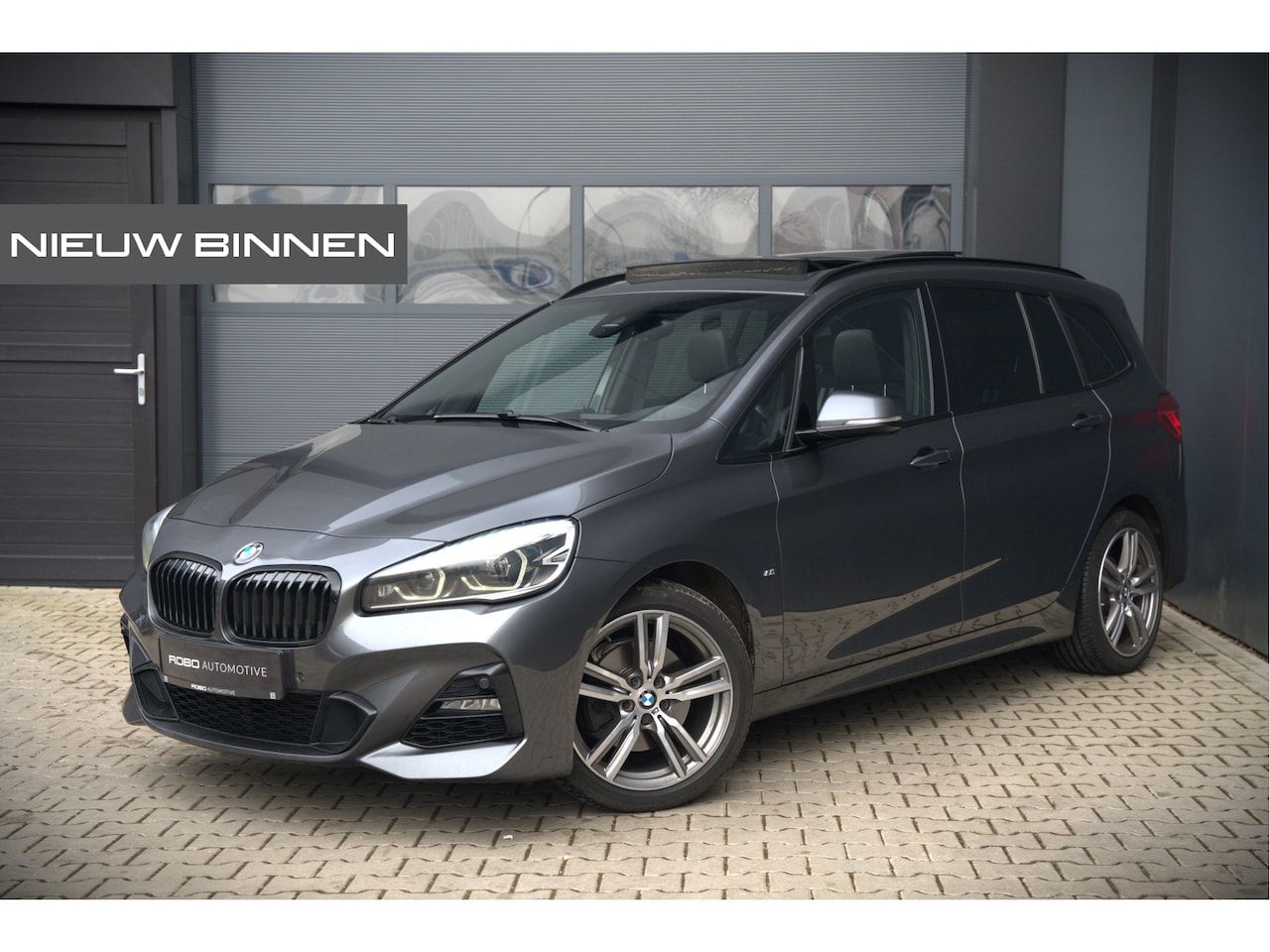 BMW 2-serie Gran Tourer - 218i 7p. High Executive M Sport | Panoramadak | Stoelverwarming | Trekhaak | Adaptive LED - AutoWereld.nl