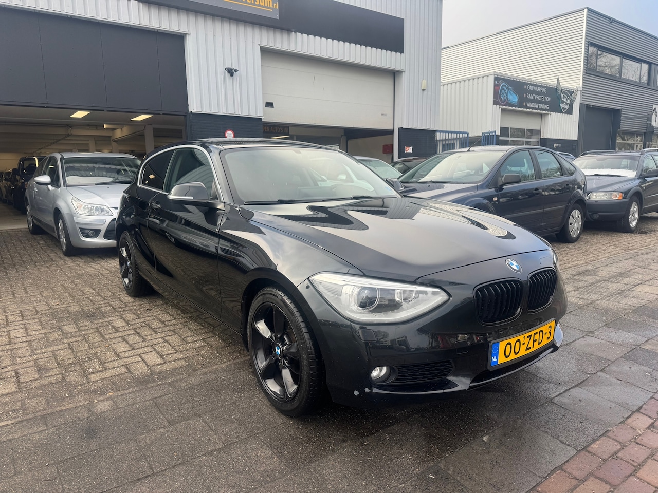 BMW 1-serie - 116i Business+ AUTOMAAT - AutoWereld.nl