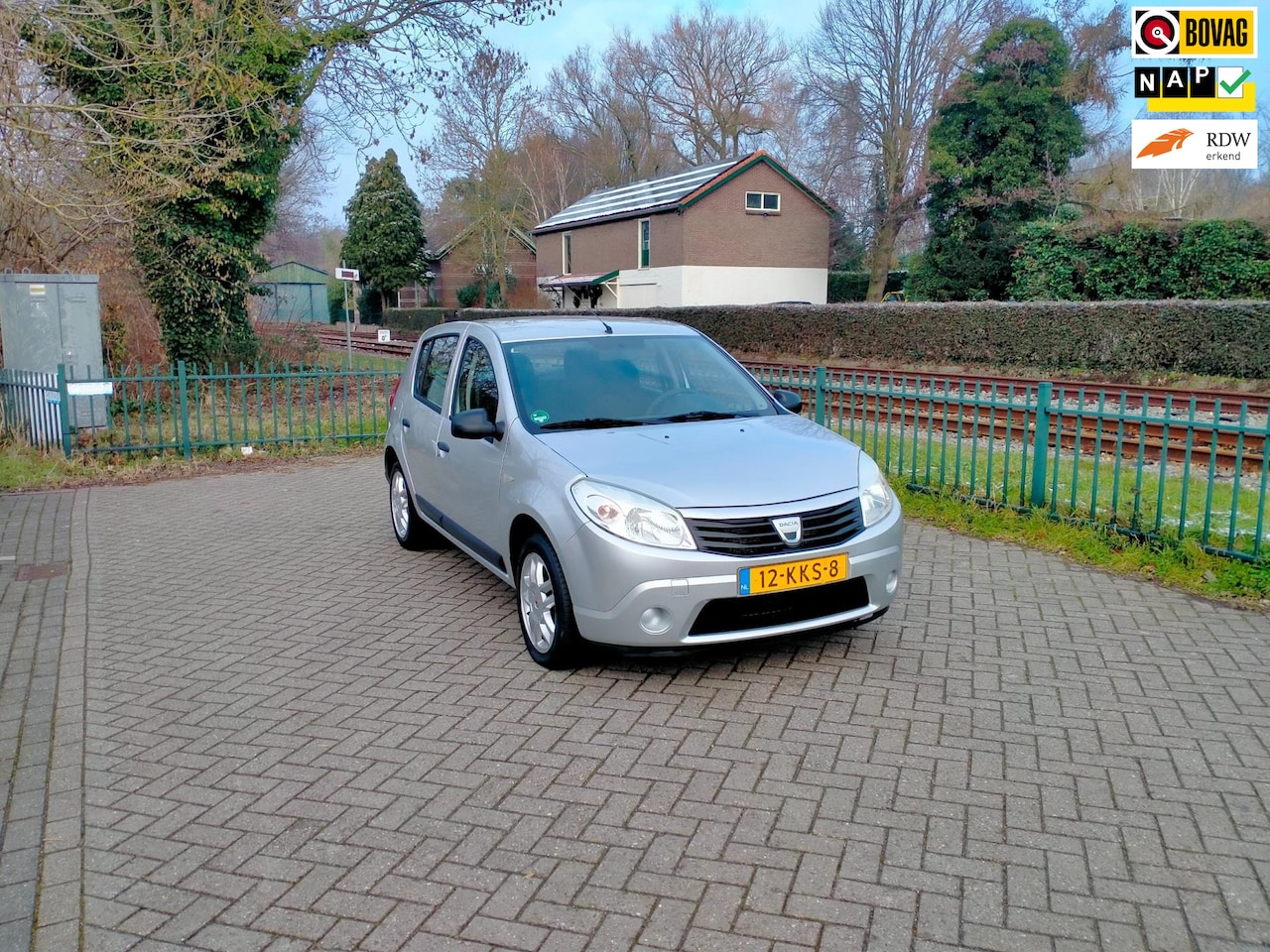 Dacia Sandero - 1.2 Ambiance airco trekhaak ALLINPRIJS - AutoWereld.nl