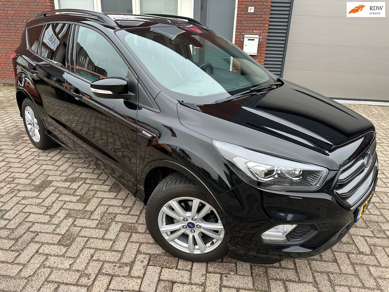 Ford Kuga - 1.5 EcoBoost Vignale / Leder / Navi / PDC / Camera / Clima - AutoWereld.nl