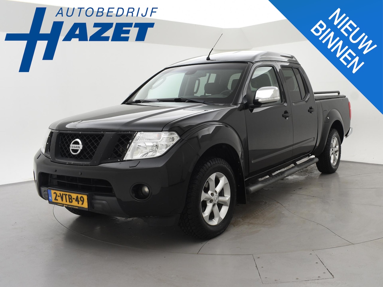 Nissan Navara - 2.5 DCI 190 PK AUT. 4X4 5-PERSOONS DOUBLE CAB + 3000 KG TREKHAAK | CAMERA | STOELVERWARMIN - AutoWereld.nl