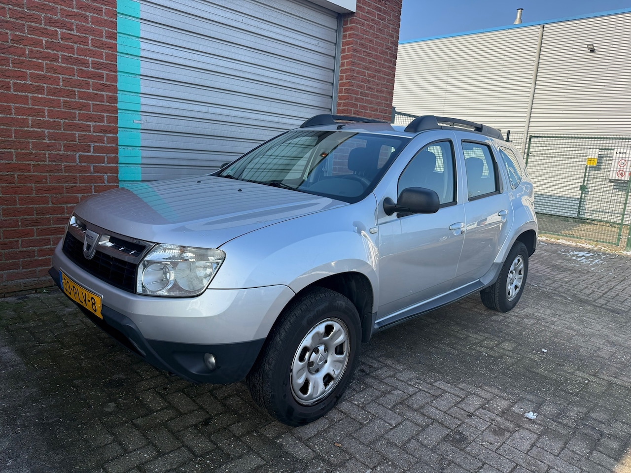 Dacia Duster - 1.6 Lauréate 2wd Airco Bj:2011 NAP! - AutoWereld.nl