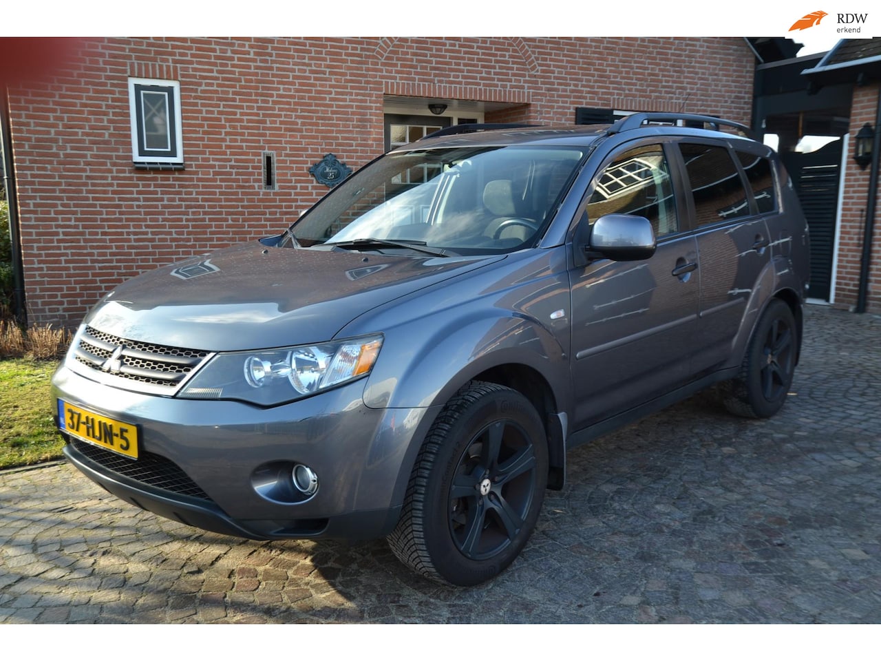 Mitsubishi Outlander - 3.0 Intense - Automaat - Airco - Velgen - Cruise control - Trekhaak - Schuidak - El.Ramen - AutoWereld.nl