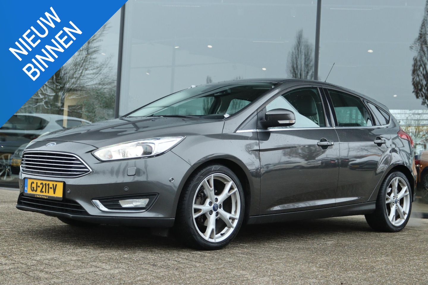 Ford Focus - 1.0 TITANIUM ED. | XENON | WINTERPACK | NAVI | PDC | CRUISE - AutoWereld.nl