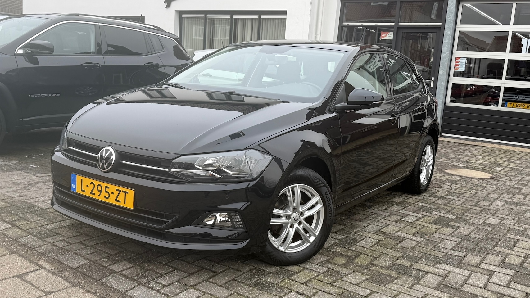 Volkswagen Polo - 1.0 TSI Comfortline Business 1.0 TSI Comfortline Business, Apple Carplay/Android,Navigatie,Achteruitrij camera - AutoWereld.nl