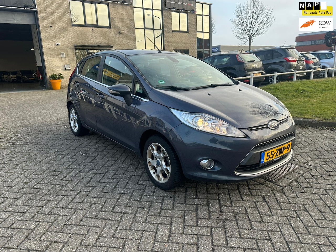 Ford Fiesta - 1.25 Titanium Cruise controle! 5 Deurs! Xenon! - AutoWereld.nl
