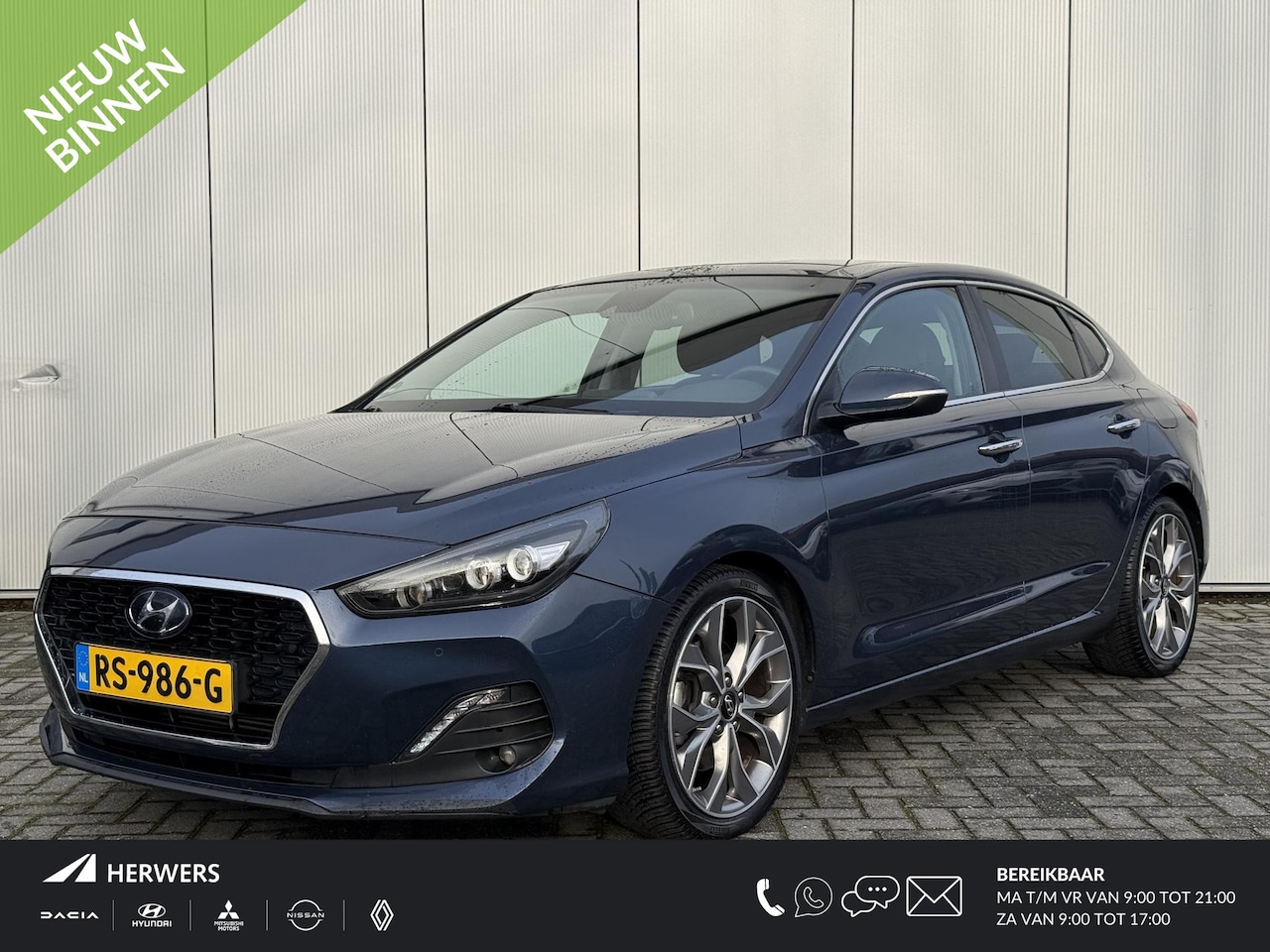 Hyundai i30 Fastback - 1.4 T-GDI Premium / Lederen Bekleding / Panorama Dak / Trekhaak / 18" met all season / Nav - AutoWereld.nl