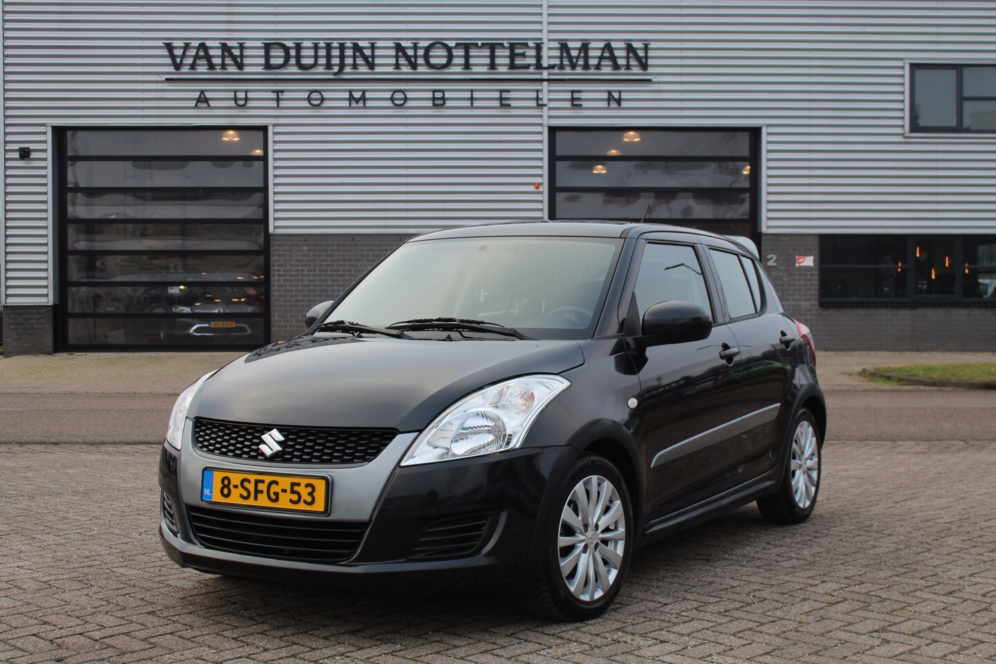 Suzuki Swift - 1.2 Comfort EASSS / Stoelverwarming / Airco / N.A.P. - AutoWereld.nl