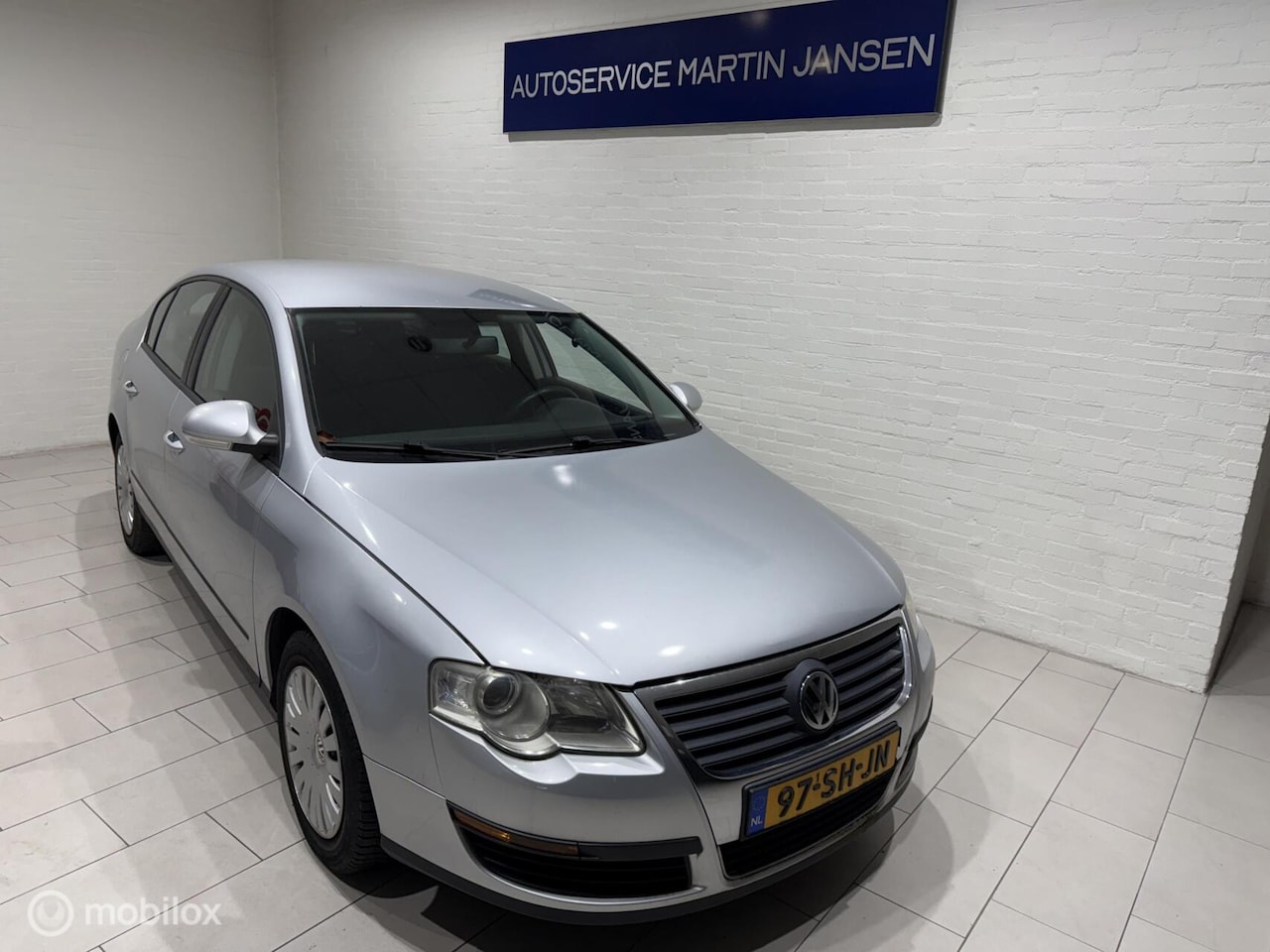 Volkswagen Passat - 1.6 FSI Trendline Navi - AutoWereld.nl