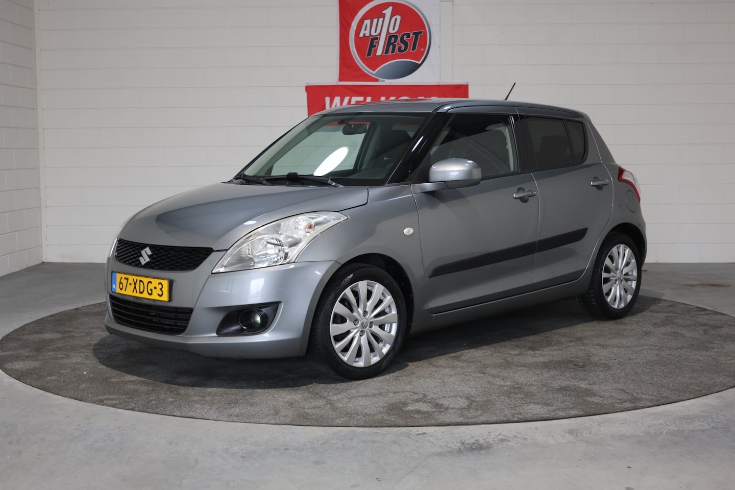 Suzuki Swift - 1.2 Exclusive EASSS 1.2 Exclusive EASSS, Climate control, Cruise control, Parkeersensoren, Stoelverwarming, Pr - AutoWereld.nl