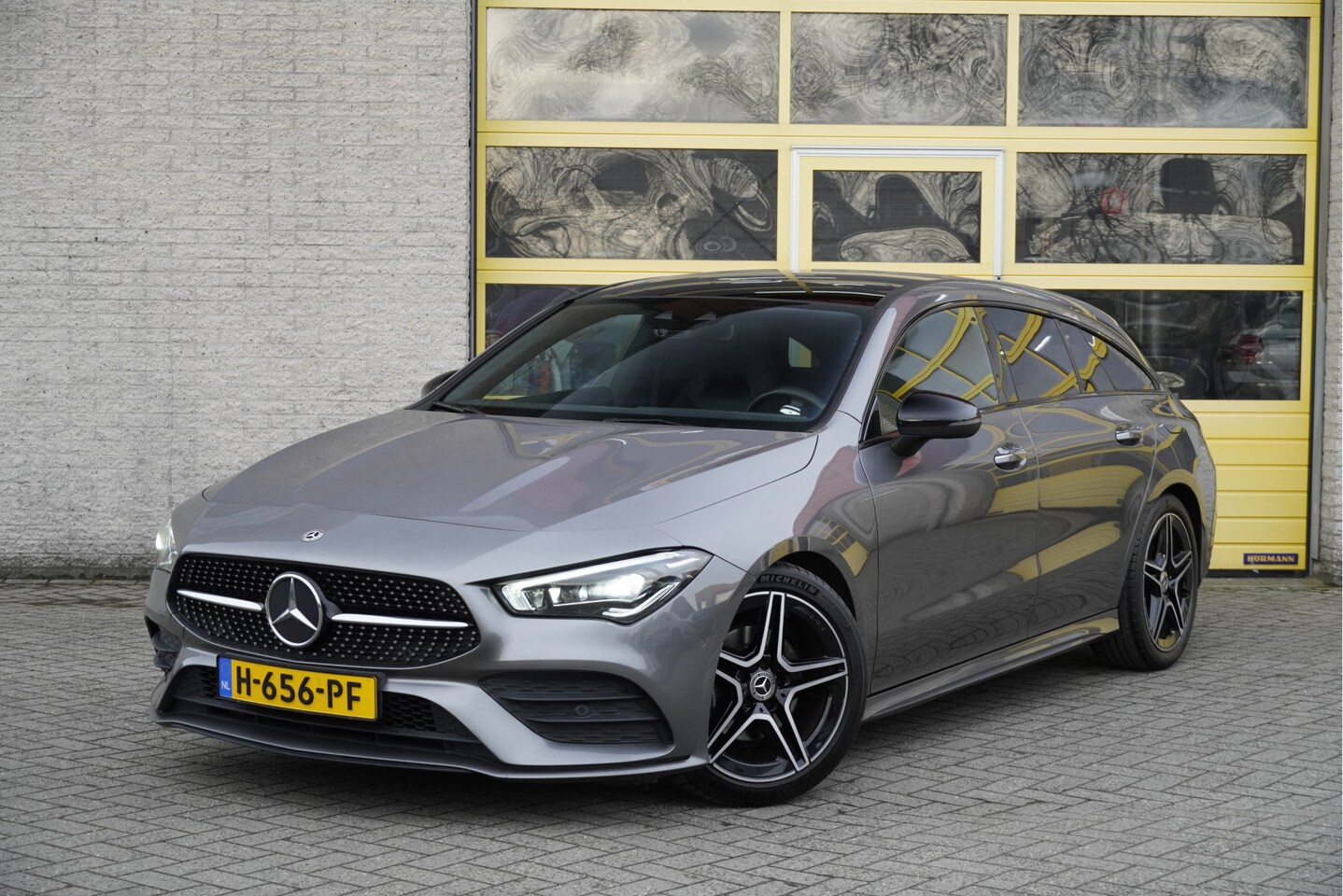 Mercedes-Benz CLA-klasse Shooting Brake - 180 Automaat! AMG BJ2020 Lmv 18" | Led V+A | Pdc | Navi | Keyless entry | Panoramadak | El - AutoWereld.nl