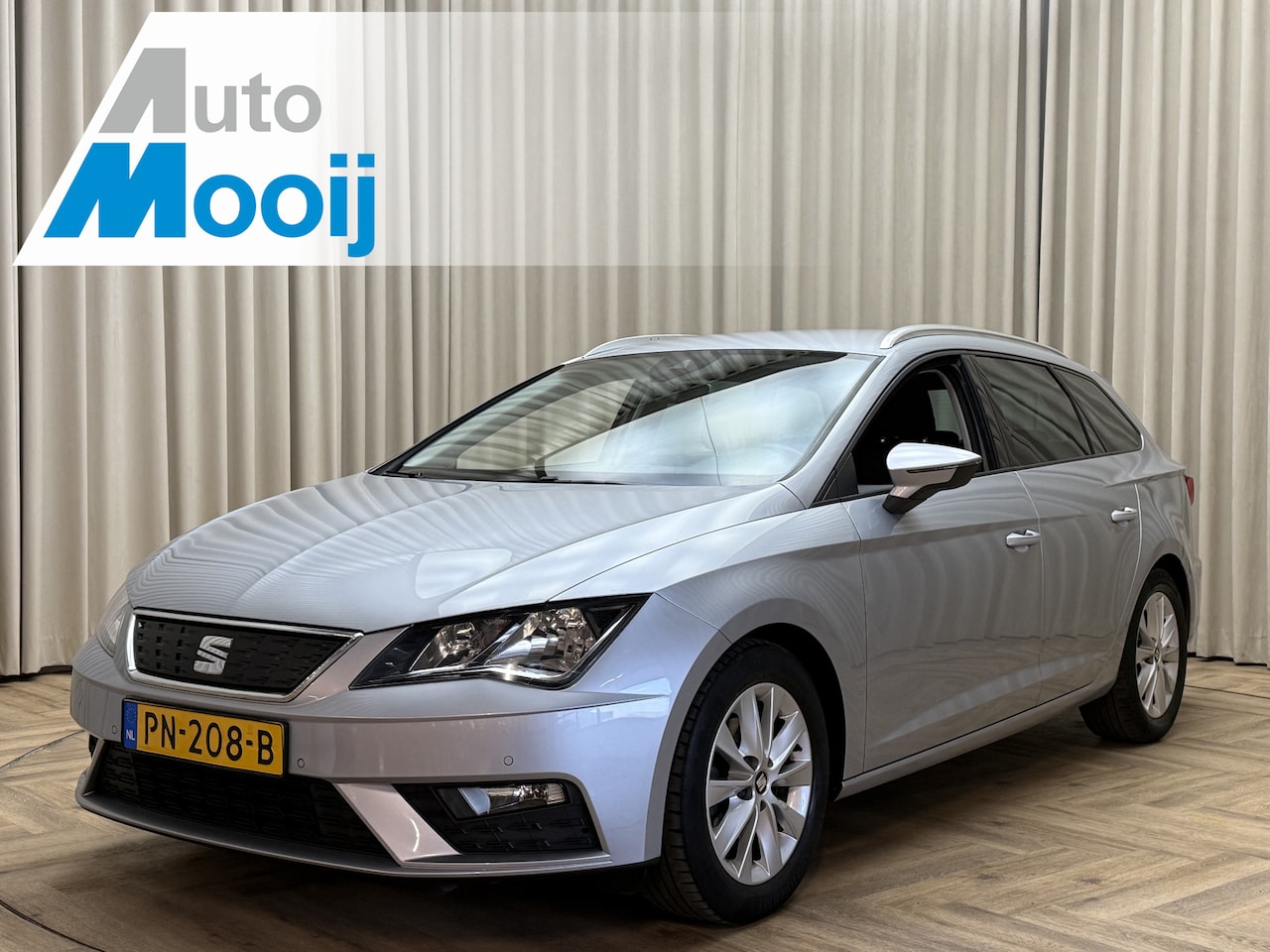 SEAT Leon ST - 1.0 EcoTSI Org.NL! / Carplay / Keyless / Cruise Control / ECC Clima / Navigatie / PDC V&A - AutoWereld.nl