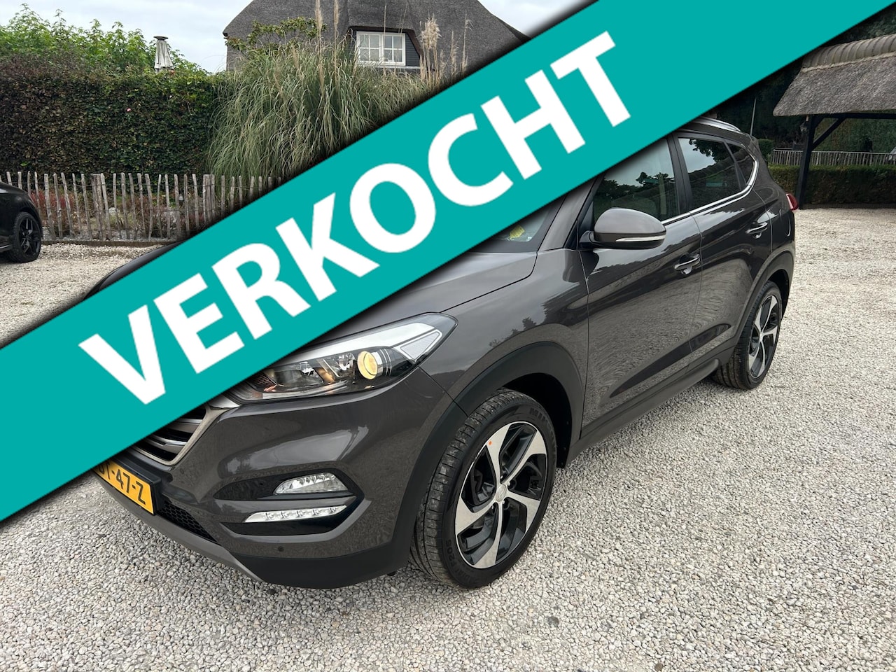 Hyundai Tucson - 1.6 T-GDi Premium 4WD 177 pk automaat. Leder - AutoWereld.nl