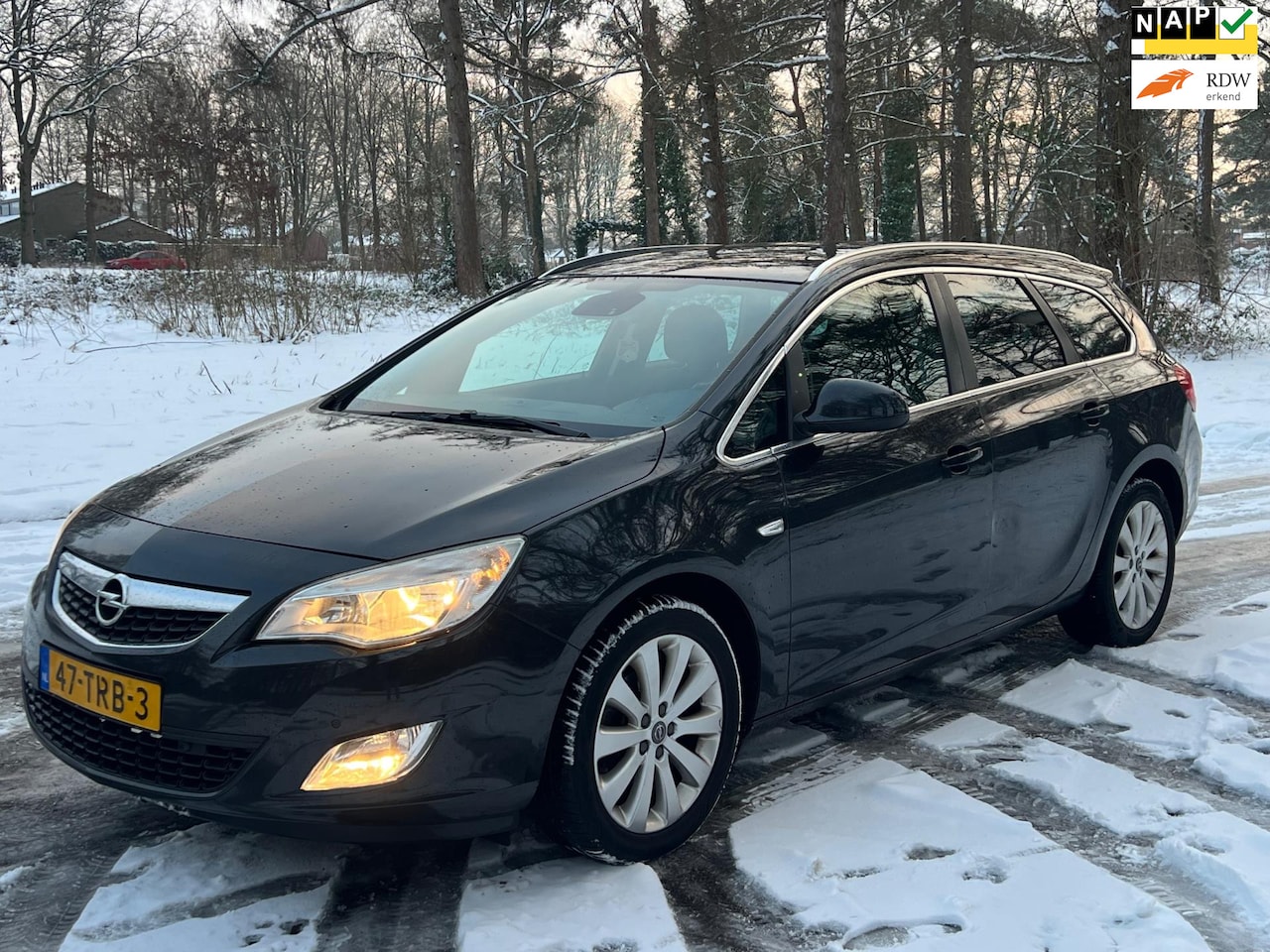Opel Astra Sports Tourer - 1.4 Cosmo 2012 Zwart - AutoWereld.nl