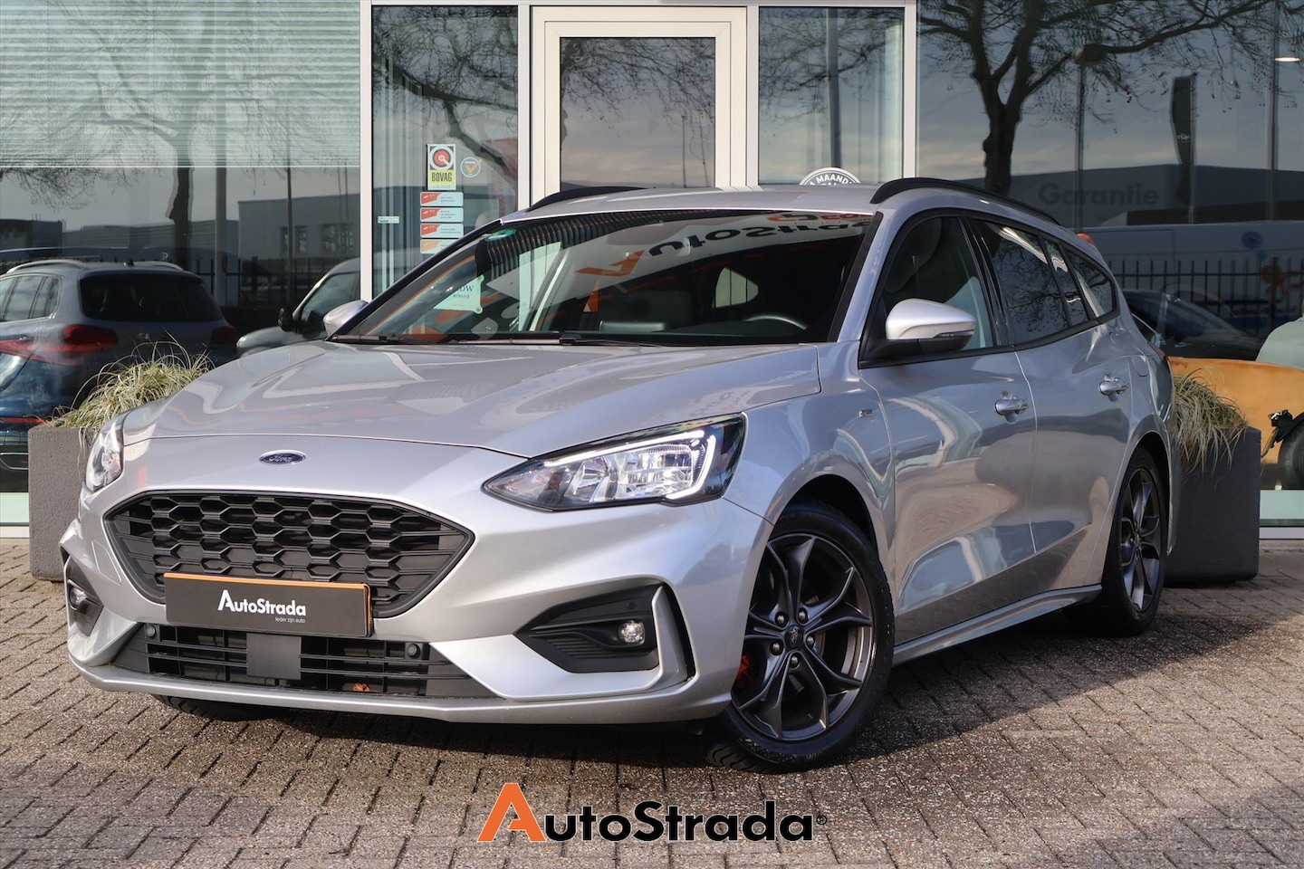 Ford Focus Wagon - 1.0 ST-Line 155pk | Cruise | Climate | Trekhaak | Virtual | B&O Audio | Camera | Keyless | - AutoWereld.nl