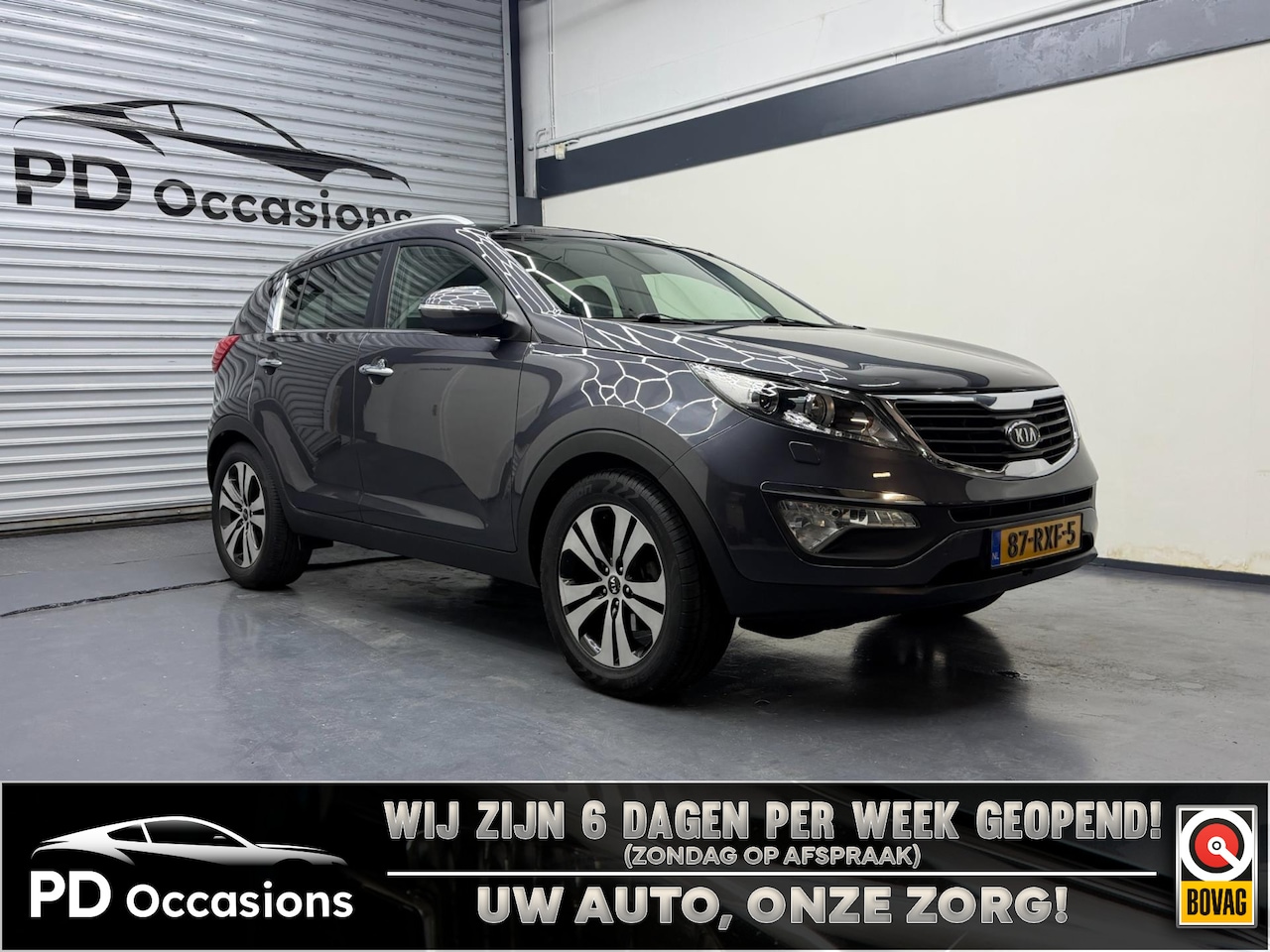 Kia Sportage - 2.0 X-clusive - Pano - Camera - Navi - Cruise - Leer - AutoWereld.nl