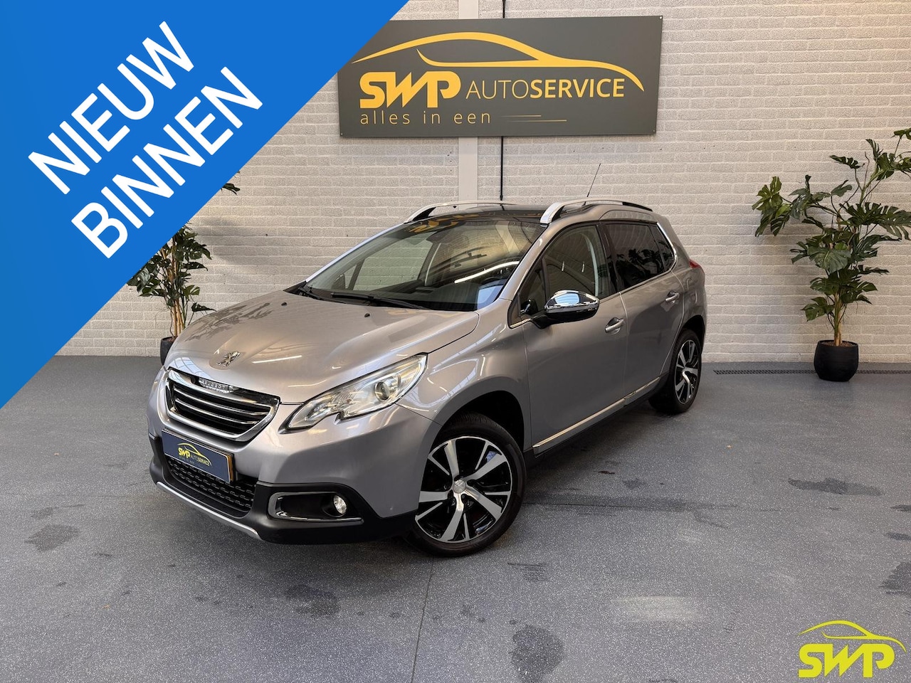 Peugeot 2008 - 1.6 VTi Féline | Navi | Pano | Leder | Carplay | Trekhaak - AutoWereld.nl