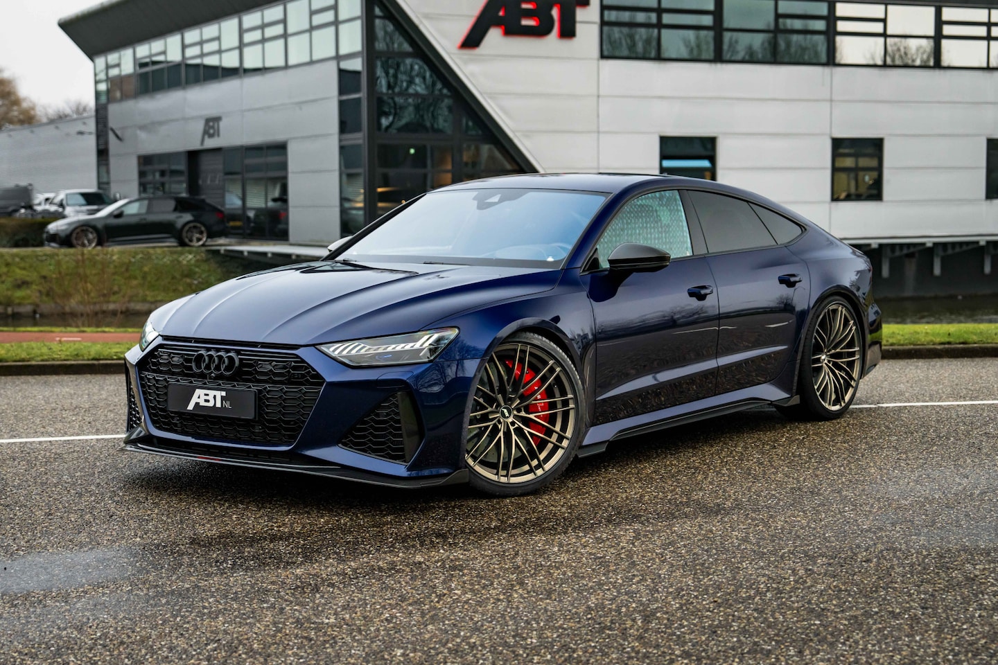 Audi RS7 - Sportback ABT RS7-S | ABT HR22 matt racing gold | Akrapovic | Audi Exclusive | Carbon opti - AutoWereld.nl