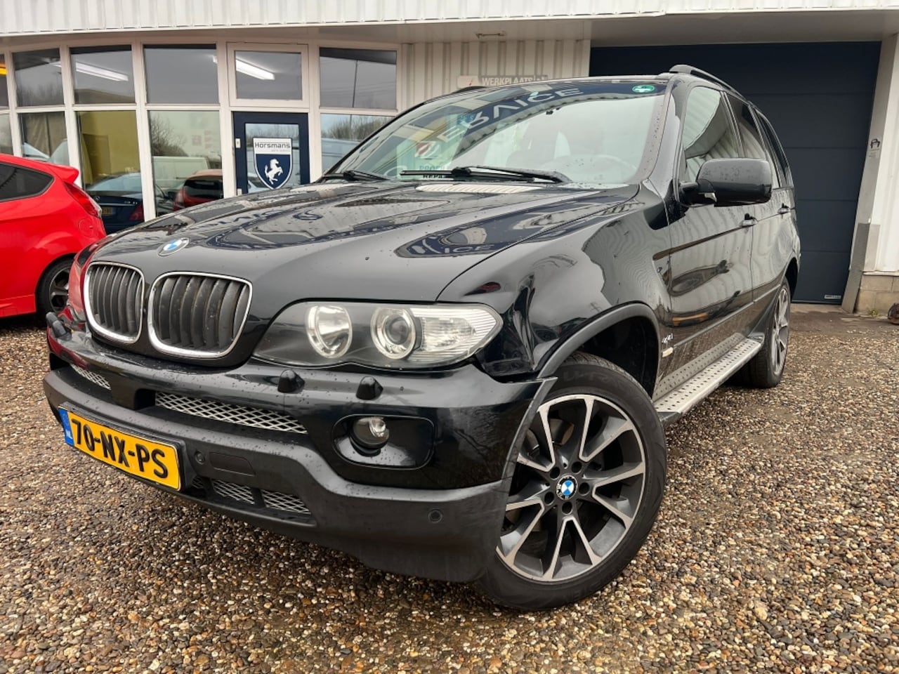 BMW X5 - 4.4i High Executive 4.4i High Executive - AutoWereld.nl