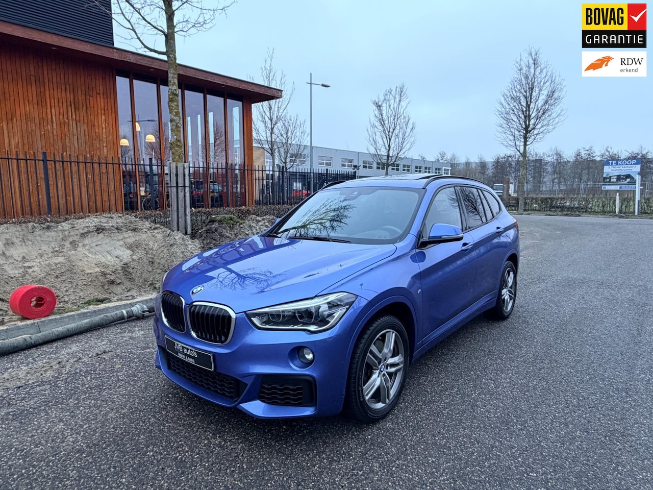 BMW X1 - SDrive20i M- sport, panorama, trekhaak, HUD - AutoWereld.nl