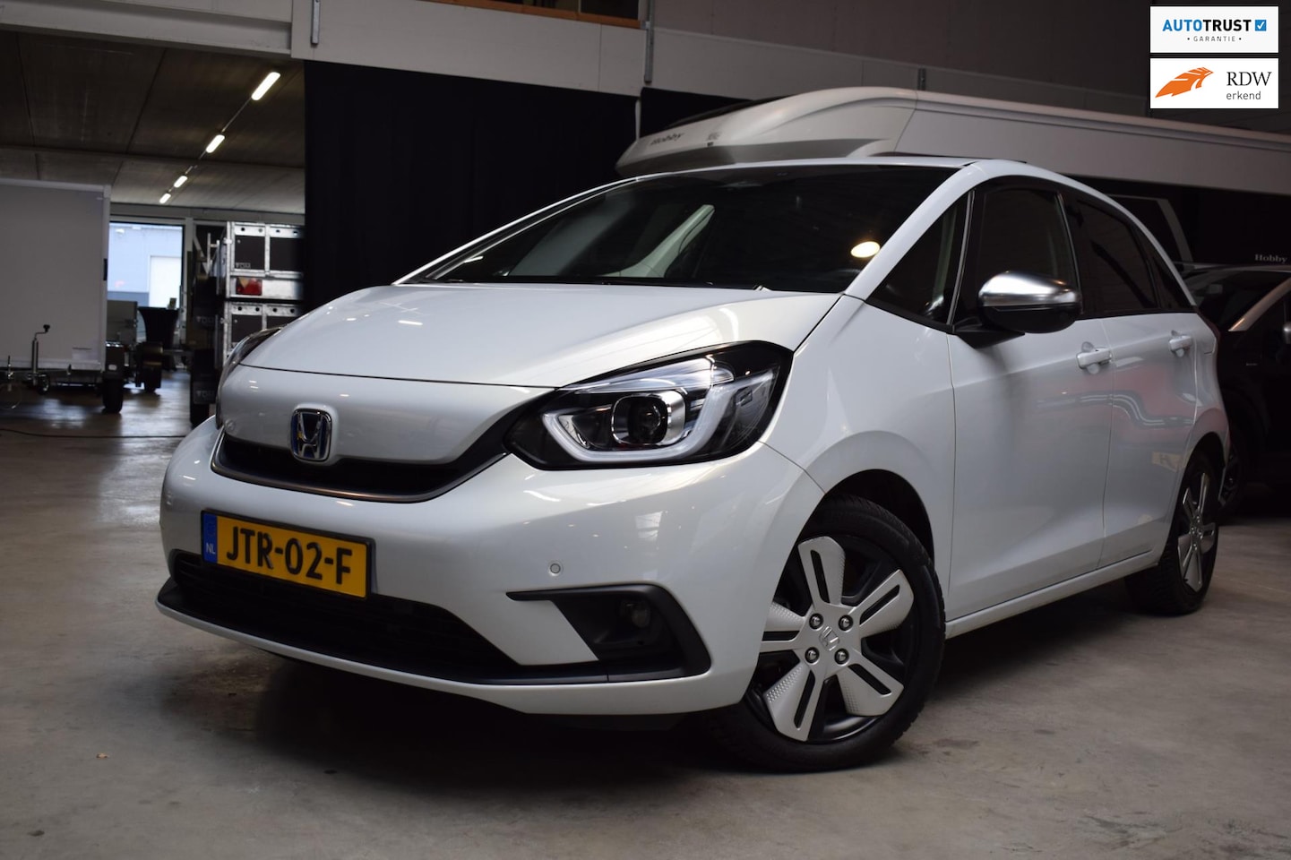 Honda Jazz - 1.5 e:HEV Executive alle opties 12 mnd garantie - AutoWereld.nl