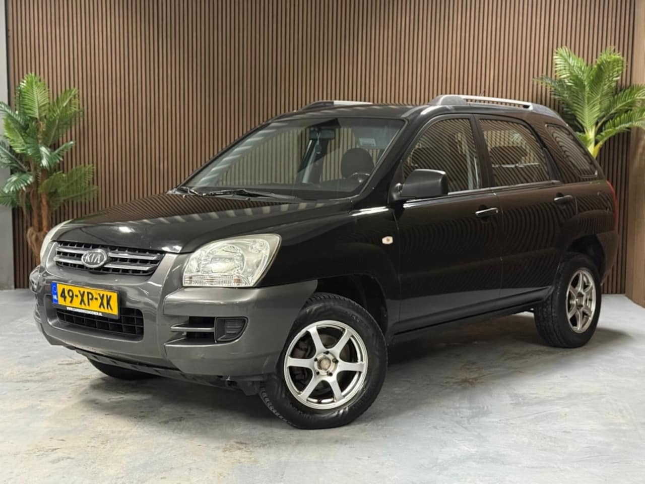 Kia Sportage - 2.0 CVVT Comfort 2.0 CVVT Comfort - AutoWereld.nl
