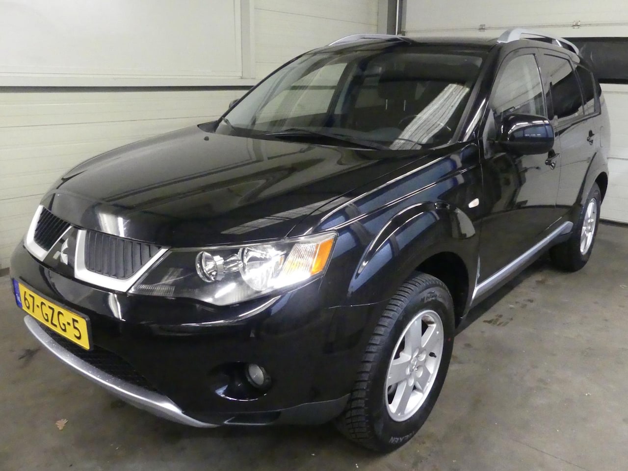 Mitsubishi Outlander - 2.4 Inspire 2WD - Trekhaak - Airco - Cruise control - AutoWereld.nl