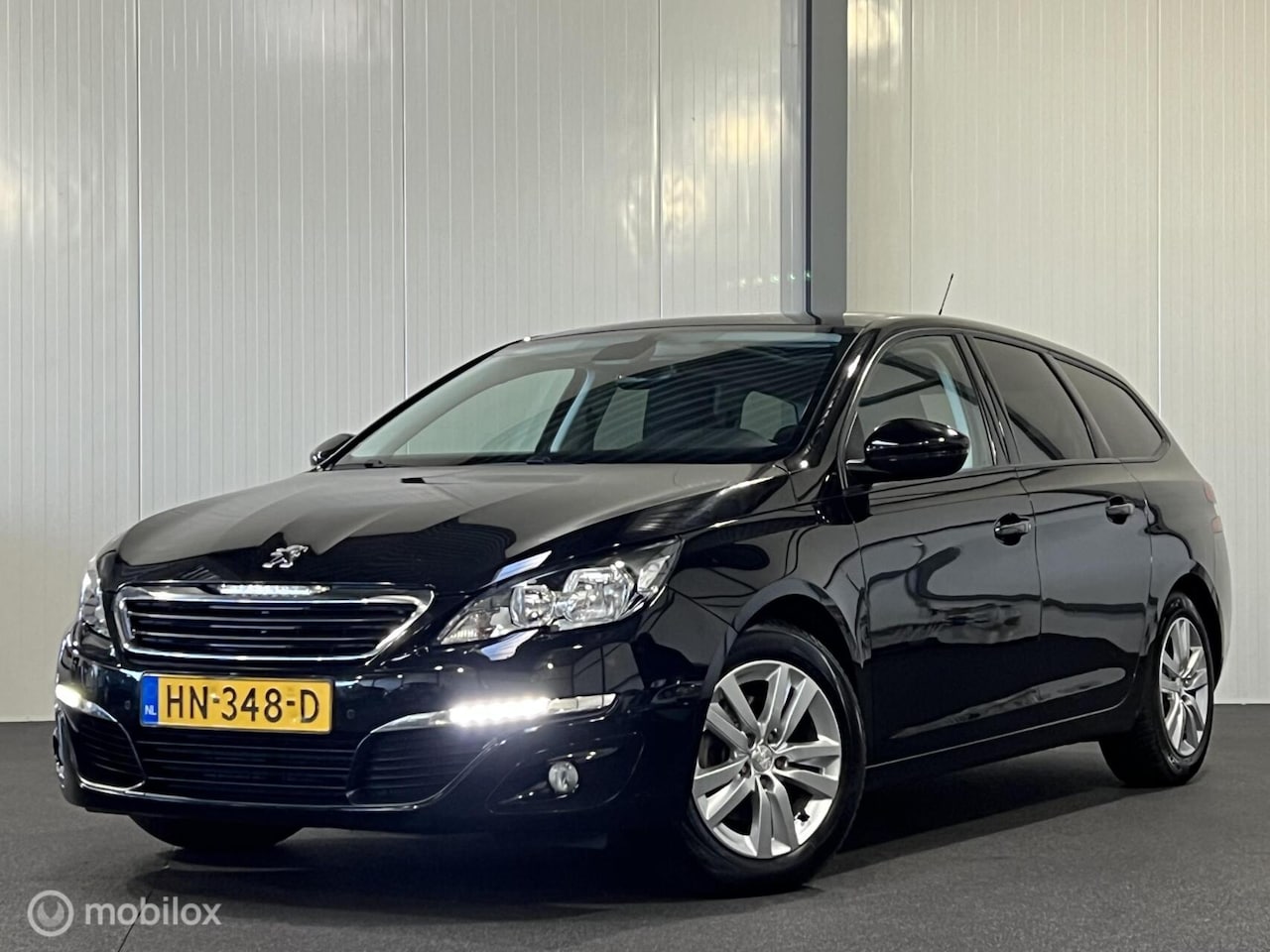 Peugeot 308 SW - 1.6 BlueHDI Blue Lease Exec. [ NAP trekhaak panorama ] - AutoWereld.nl