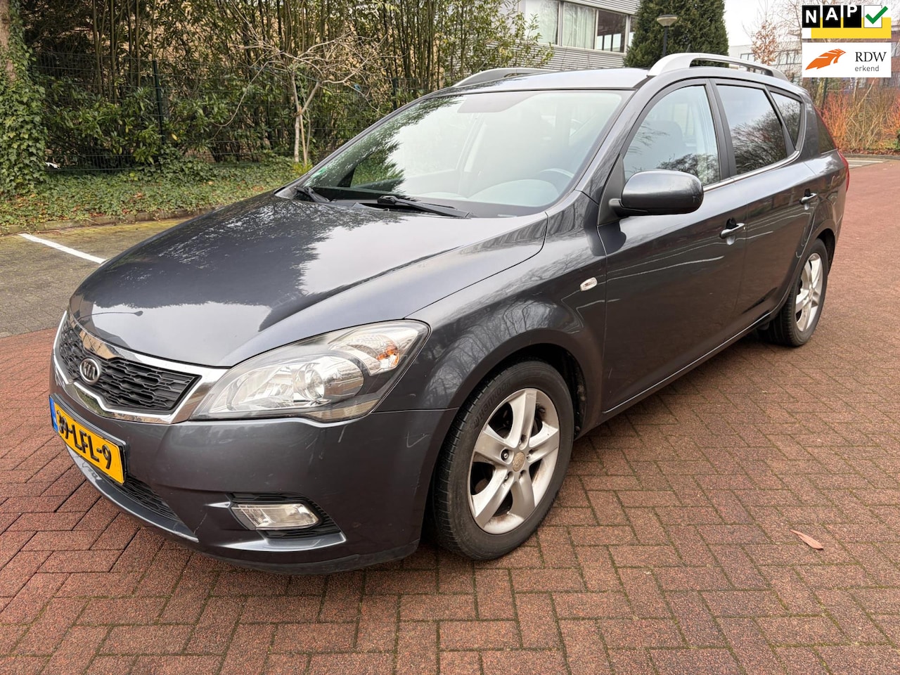 Kia Cee'd - 1.4 CVVT X-ecutive / Airco / Navi / PDC / Trekhaak - AutoWereld.nl