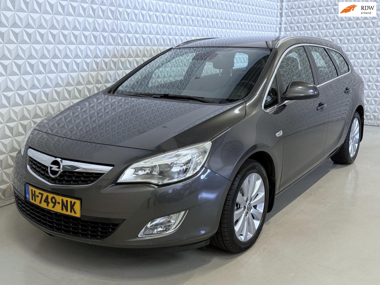 Opel Astra Sports Tourer - 1.4 Turbo Sport / 185.000km (2011) - AutoWereld.nl